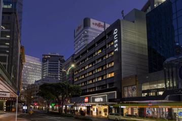 The buildings on Lambton Quay, a street in Wellington's CBD, at dusk.