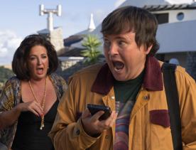 Person yelling into phone on Small Town Scandal film set