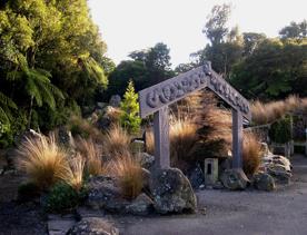 A marae entrance arch sculpture at Ōtari-Wilton's Bush.