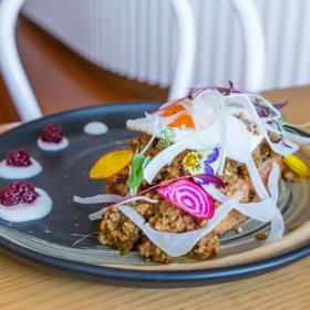 Close-up shot of a plate of food at Comes and Goes in Lower hutt.