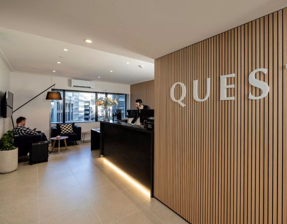 The front desk at Quest 256 Lambton hotel, location on Lambton Quay in Wellington.