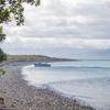 A boat landing on one of the rocky beaches of Kapiti Island.