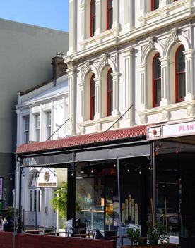 Cuba streets 19th and 20th century art deco buildings along the street.