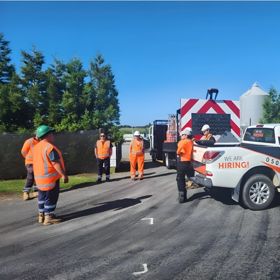 Roadworkers on a street before starting work