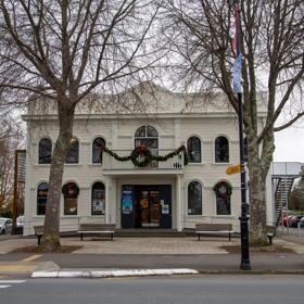 The screen location of Greytown, a historic small town featuring Victorian buildings,  stables, colonial cottages, and rural landscapes surrounding.