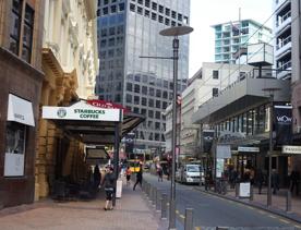 The mix of modern and old buildings along Lambton Quay, including the old supreme court, and old bank.
