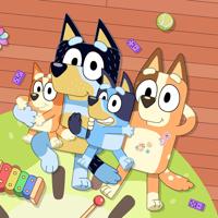 A frame from the popular children's animated television series 'Bluey'. Bluey and her family lie together on the living room floor with a few toys scattered around.