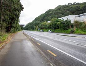 The urban setting of the Hutt Road Ngauranga Interchange, where highways got over tunnels with walls that once had graffiti.