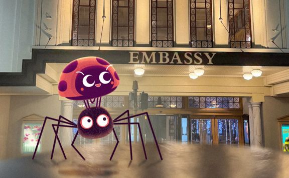 A cartoon spider and ladybug superimposed on a photograph of the Embassy Theatre building in Wellington