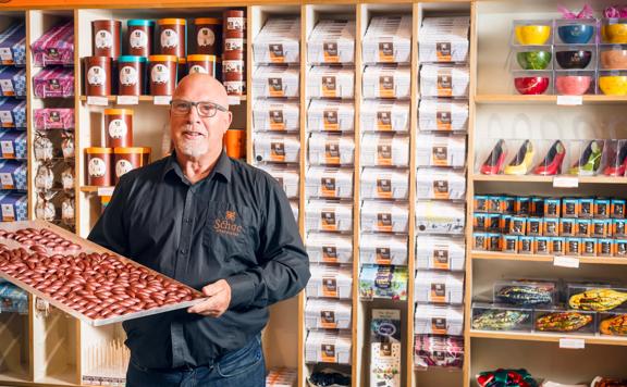 Schoc’s chocologist Murray Langham holding some of the chocolates he's created.