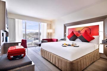 The Executive King Room inside Novotel Wellington overlooking the harbour.