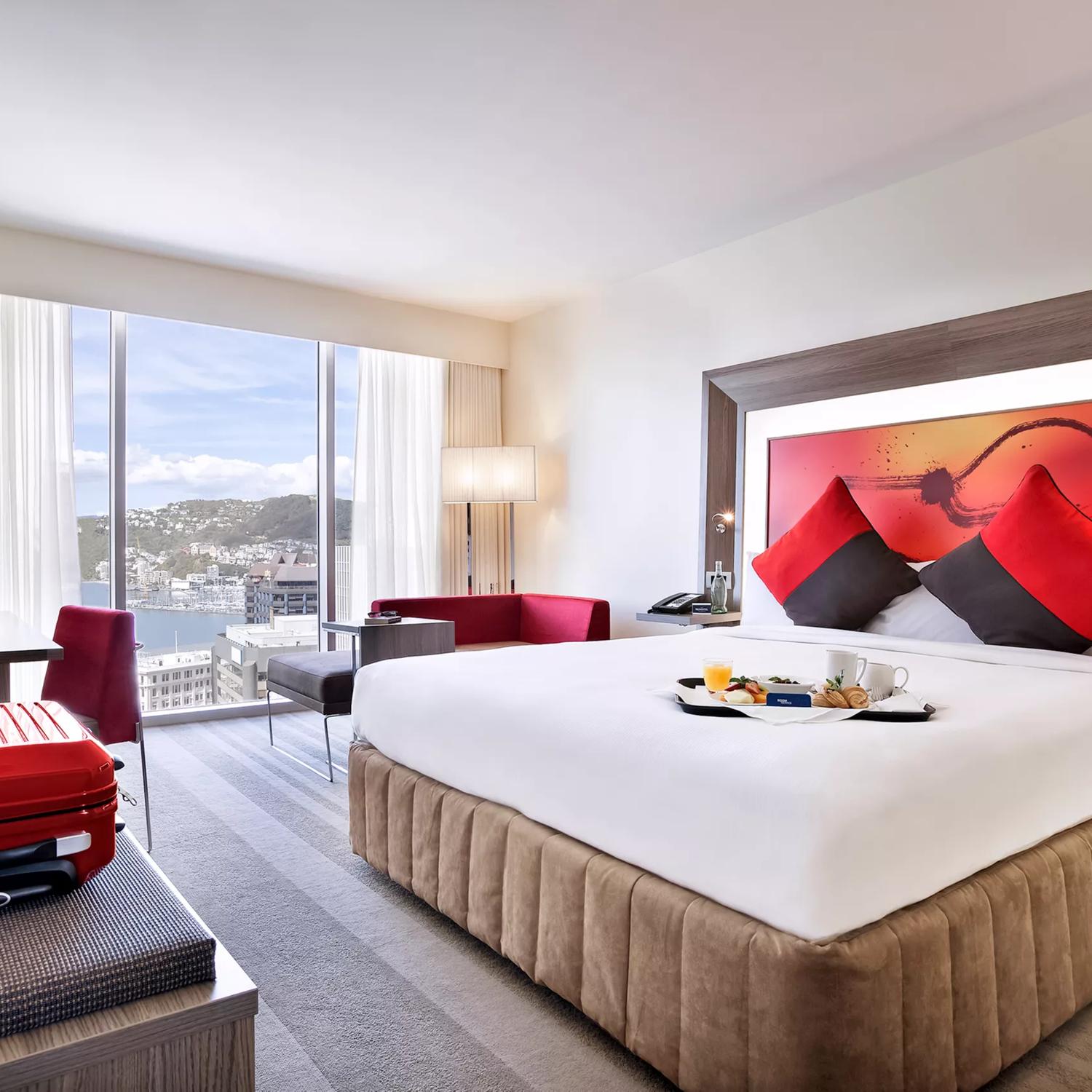 The Executive King Room inside Novotel Wellington overlooking the harbour.