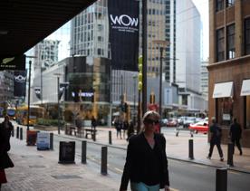 The mix of modern and old buildings along Lambton Quay, including the old supreme court, and old bank.