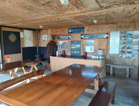 A short drive from the city is a stunning venue. Perched on a rugged coastline, it has sweeping views over the Cook Strait and the South Island.