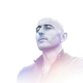 Promotional portrait for The Oneness Experience, featuring a Lee Harris in a soft purple gradient against a white background.