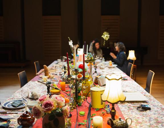 A table with wacky decor set up for the filmmakers of Unesco Diverse Voices.