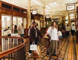A young couple shopping at Old Bank Arcade in Wellington.