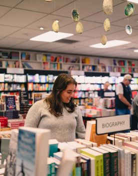 Shoppers browse the selection at Unity Books.