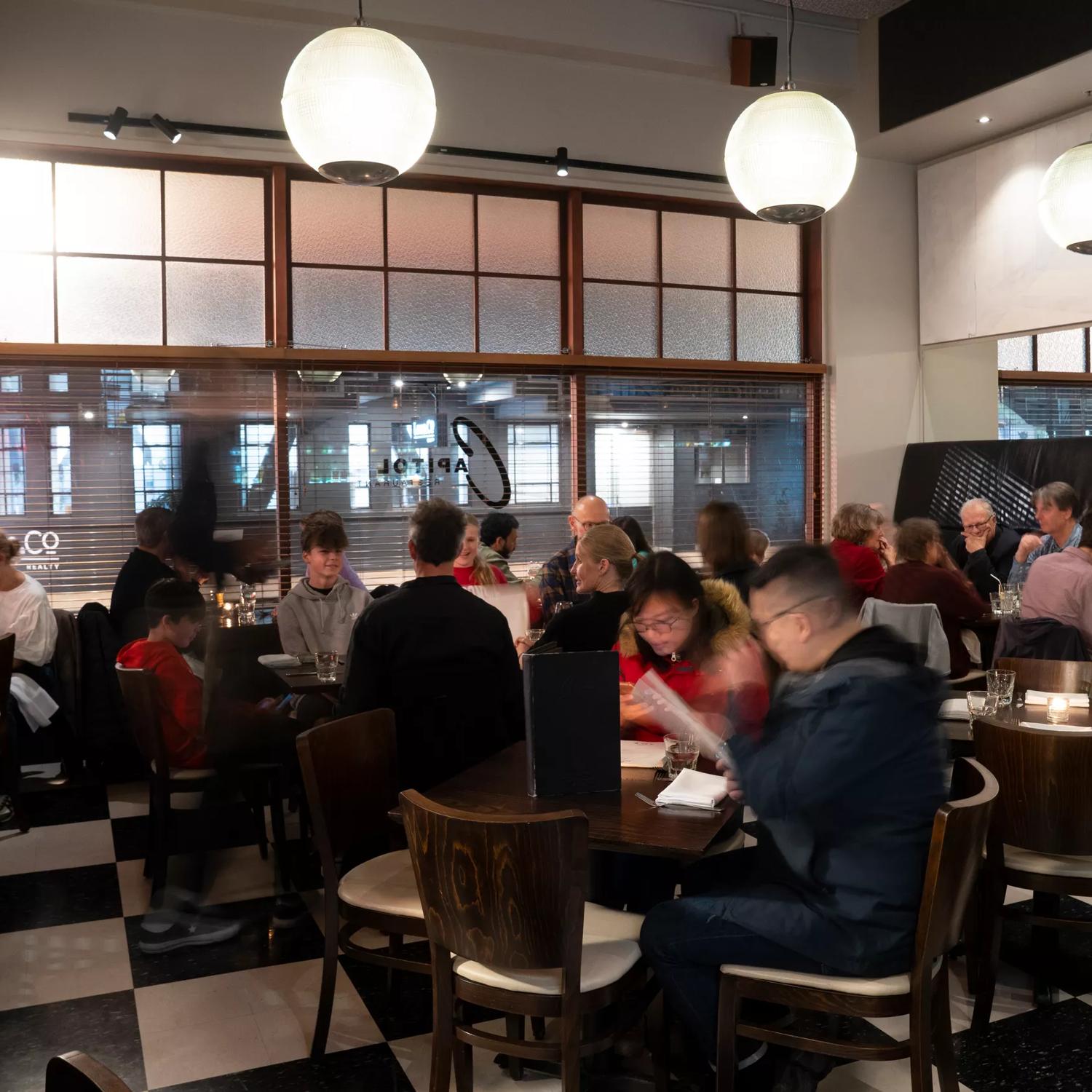 Interior shot of busy restaurant atmosphere.