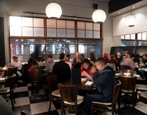 Interior shot of busy restaurant atmosphere.