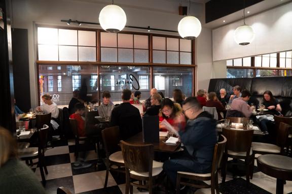 Interior shot of busy restaurant atmosphere.