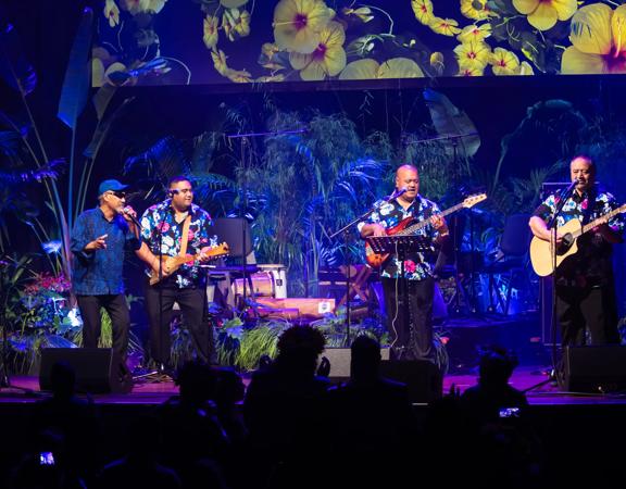 Musicians perform on stage as part of Avaiki Nui Social Returns.