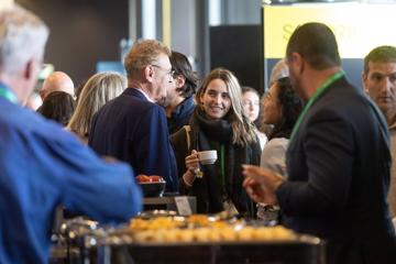 People mingling at the Life Sciences Summit 2024 at Tākina Wellington Convention and Exhibition Centre.