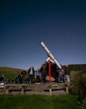 A group of people stargaze at Star Safari in Wairarapa.