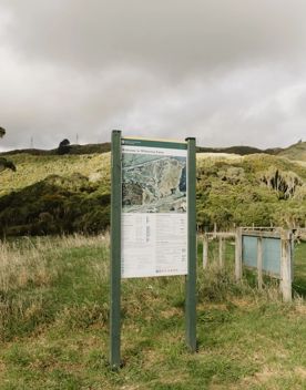 A trail map posted on Intake Valley Track at Whareroa Farm Recreation Reserve.