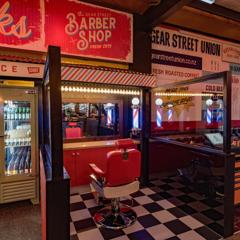 A barber chair with mirror inside Gear Street Union Lower Hutt.